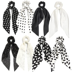 SUSULU hair scarf scrunchie in black provides secure hold for busy mornings.
