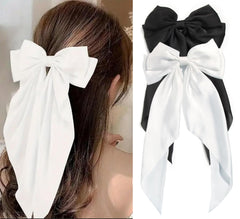 SUSULU oversized black satin bow clip adds elegant flair to daily hairstyles.