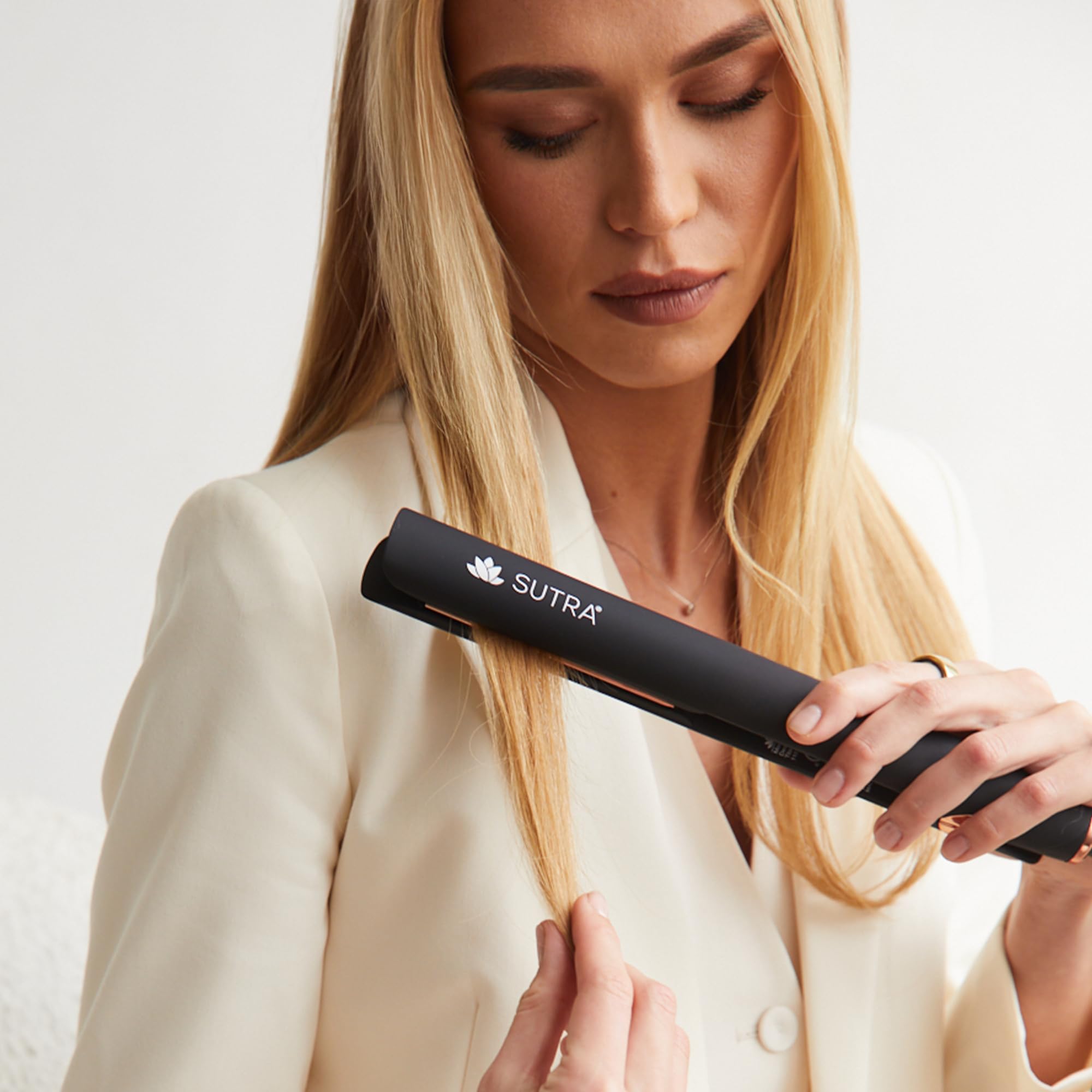 SUTRA IR2 glossy finish enhances hair shine after each pass.