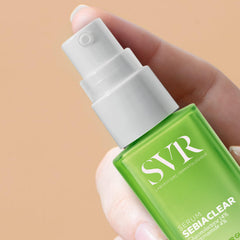 SVR Sebiaclear serum in hand demonstrates smooth texture for quick matte finish.