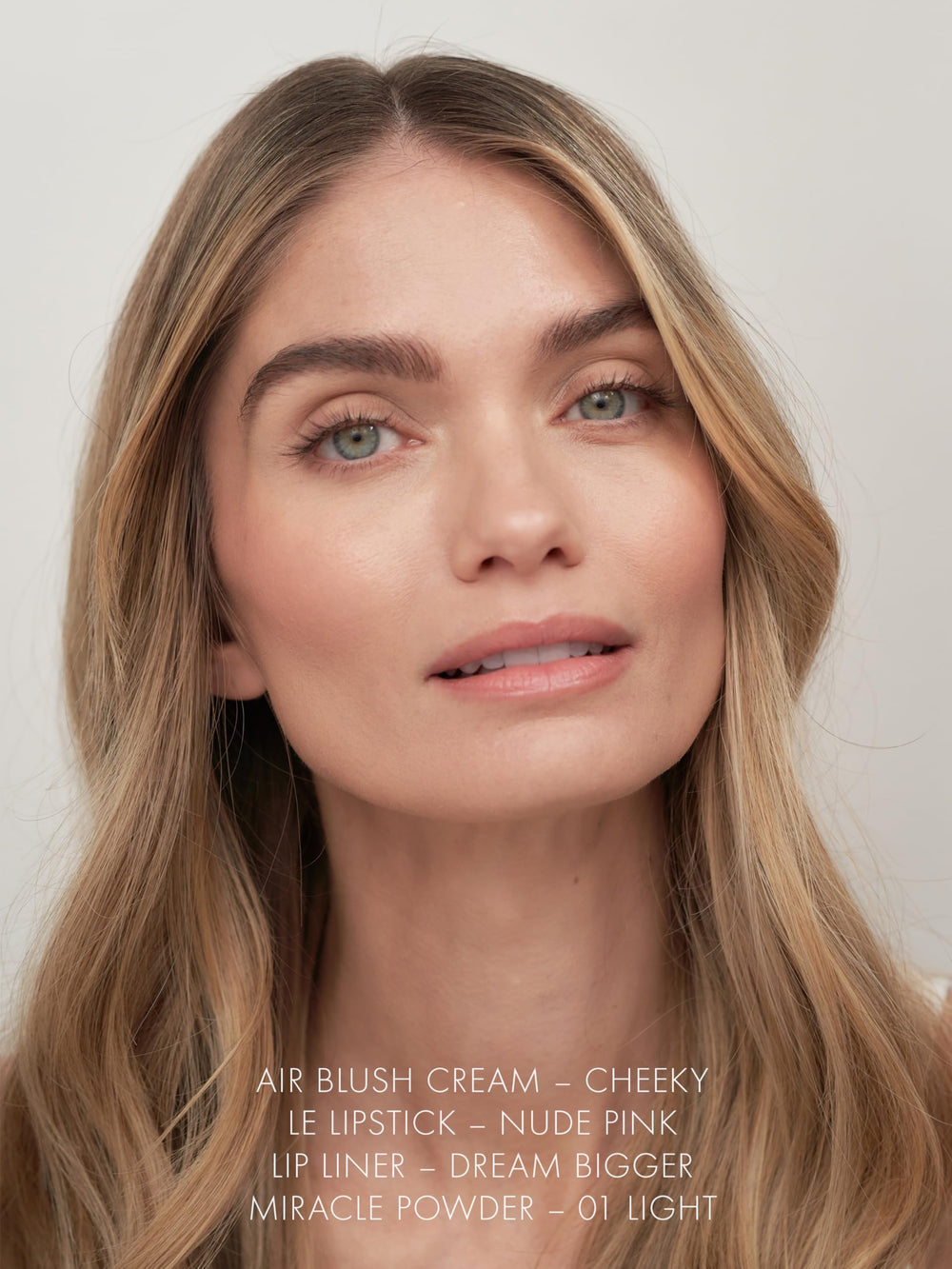 Sweed Le Lipstick application on lips demonstrates plump, moisturized finish