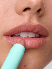 Sweed Le Lipstick nude pink swatch showing buildable color payoff