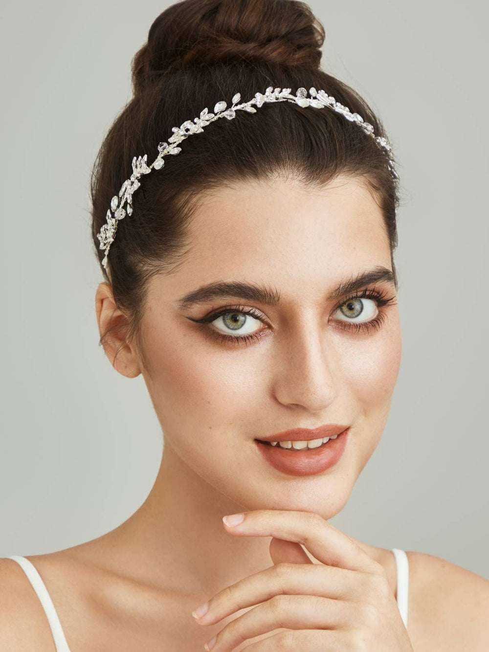 Sweetv alloy leaf design headband detail emphasizes nature-inspired texture.