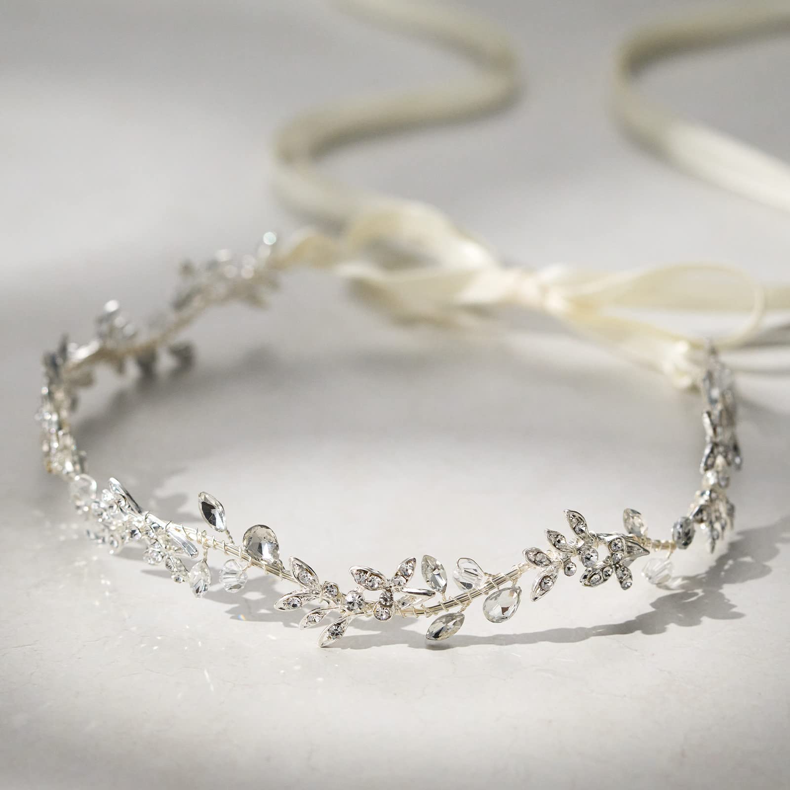 Sweetv wedding headband worn by bride or bridesmaid for coordinated elegance.