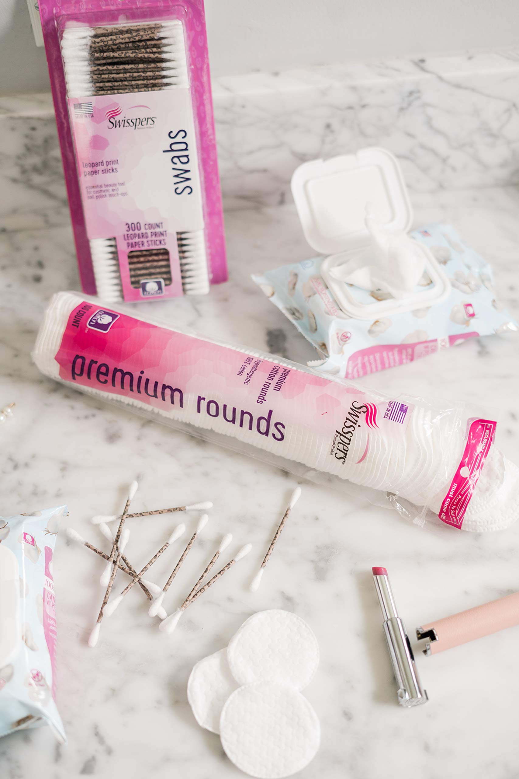 Swisspers Premium Cotton Rounds smooth-side application closeup for toner use.