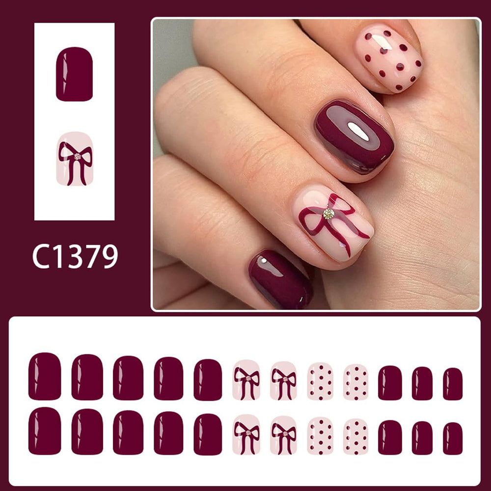 SYPAFG burgundy nails polka dot bow design close-up showcasing glossy, reusable press-on quality.