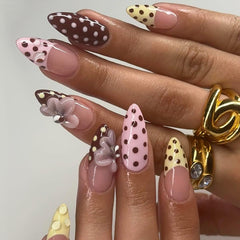 SYPAFG polka-dot press-on nails closeup shows chic French tip for on-the-go glamour.