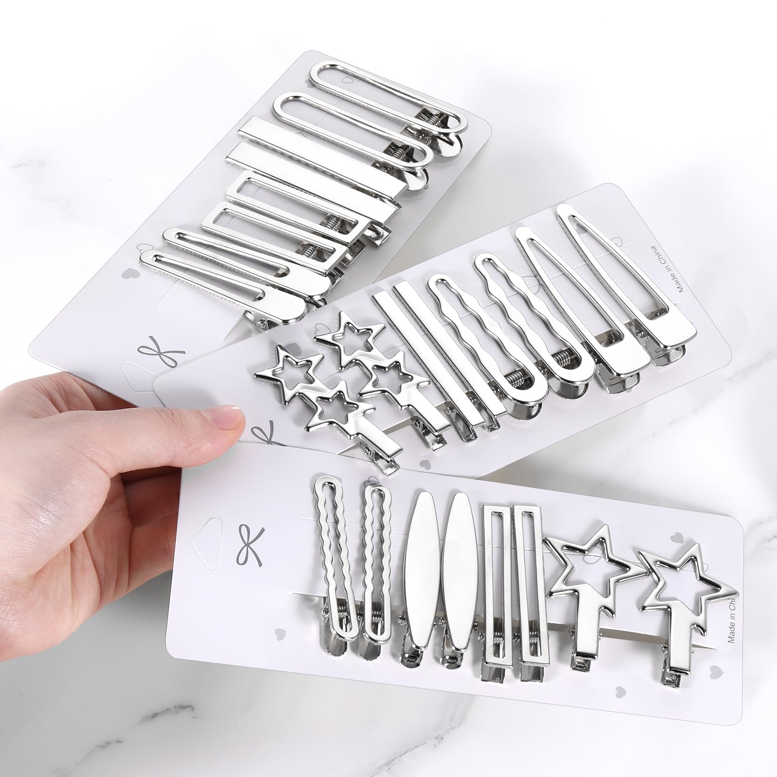 SynHHergyx geometric openwork clips boost versatile Y2K looks.