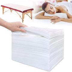 SZHZTEL disposable massage table sheets close-up of soft white fabric for hygienic spa sessions.