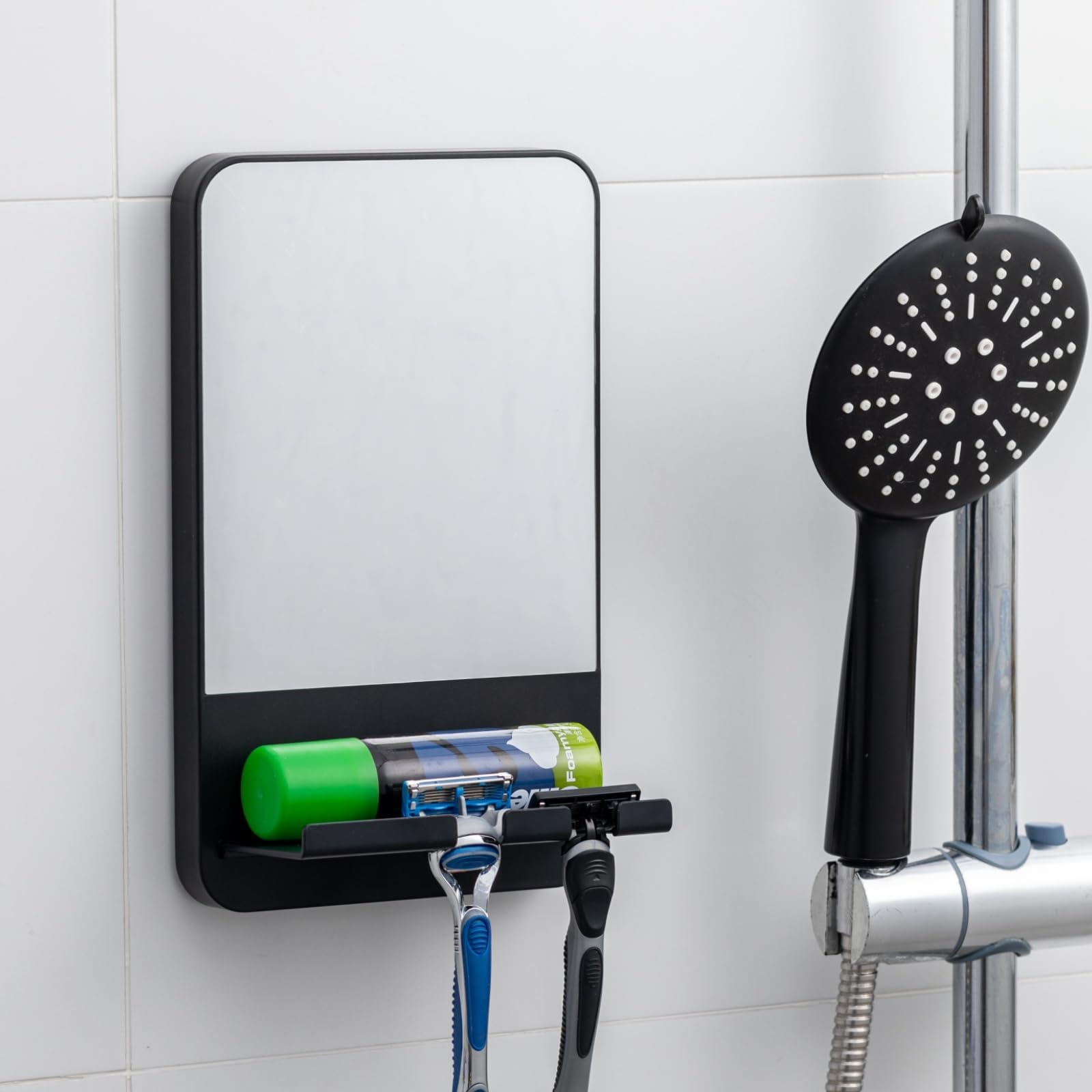 TAILI fogless shower mirror suction mount provides fog-free shaving visibility.