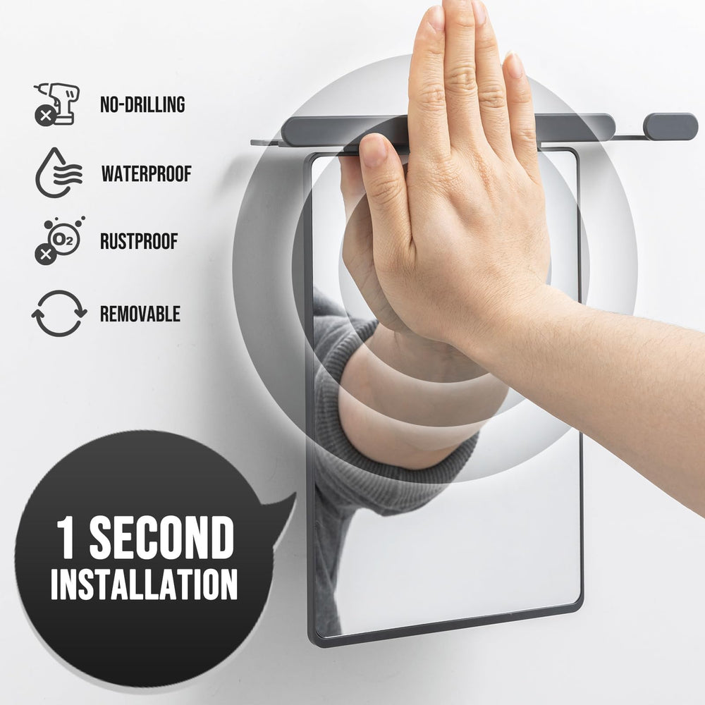 TAILI grey acrylic shower mirror provides clear fog-free reflection for morning routines.