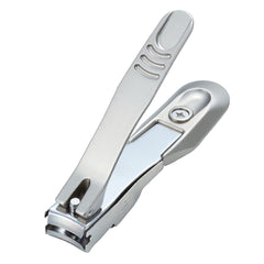 Takumi-no-waza Green Bell nail clipper in use, showcasing smooth, precise trimming