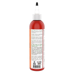 Taliah Waajid African Healing Oyl hair treatment illustrates hot oil conditioning and scalp nourishment.