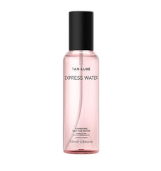 TAN-LUXE Express Water bottle close-up showing hydrating formula for a dewy glow.