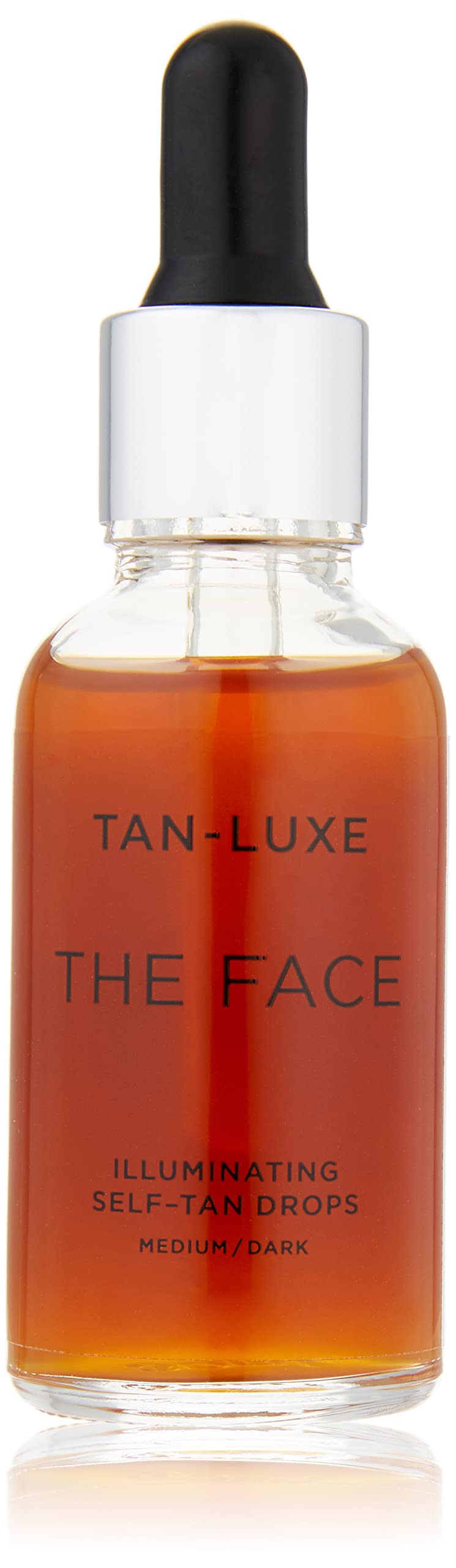 Tan-Luxe The Face Illuminating Drops bottle closeup showing customizable glow potential.