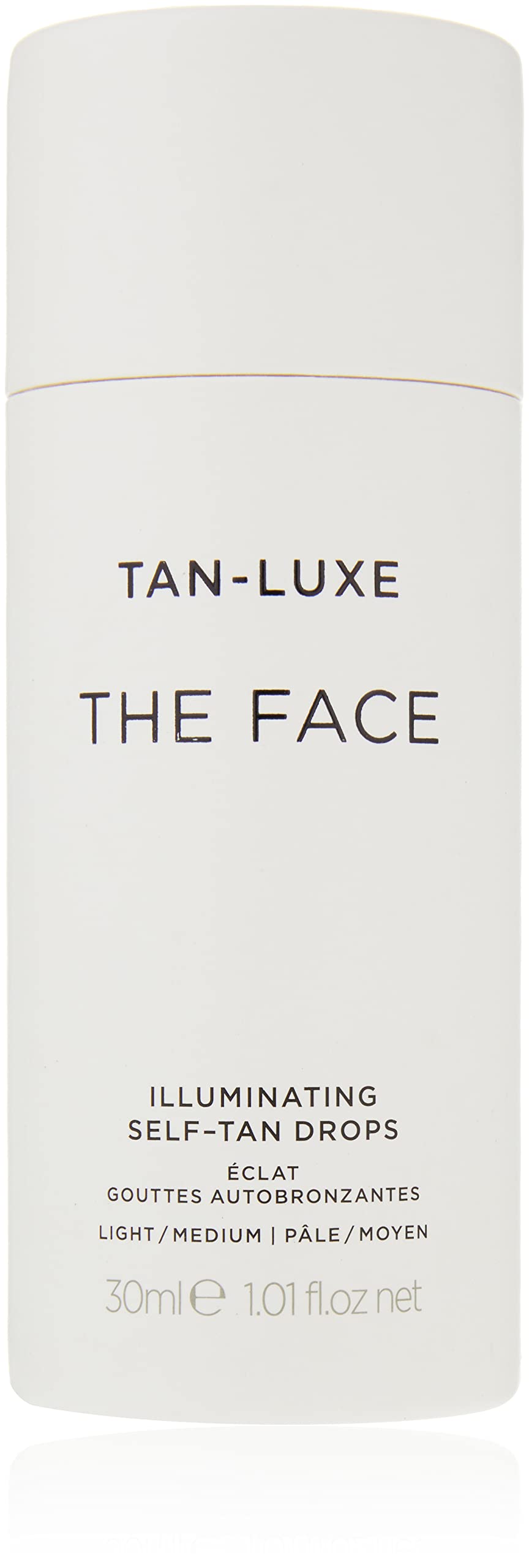 Tan-Luxe The Face drops pouring into palm for customizable glow with moisturizer