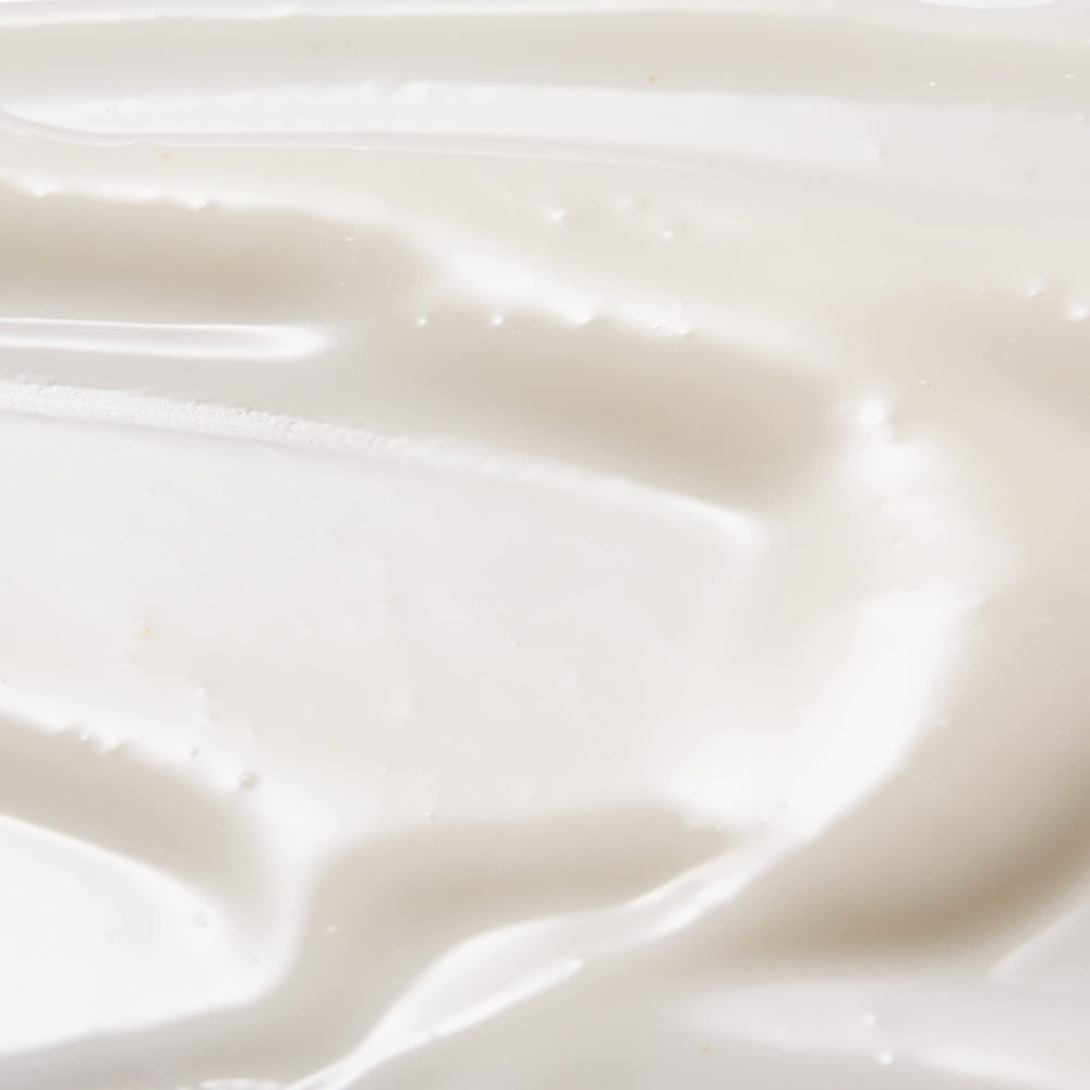 Tan-Luxe Gradual application being smoothed onto skin for hydration.
