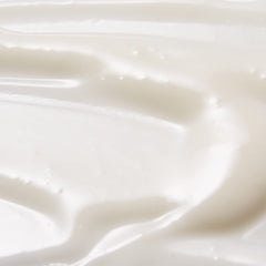 Tan-Luxe Gradual application being smoothed onto skin for hydration.