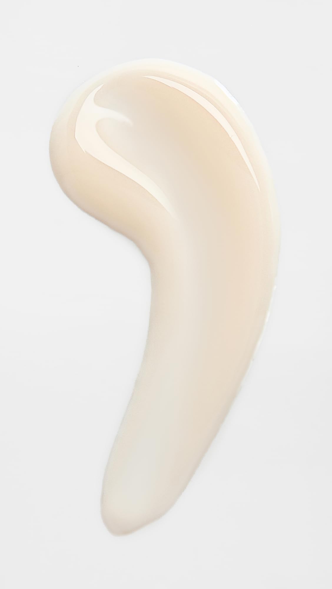 Close-up of applying Tan-Luxe The Gradual for even hydration on skin.