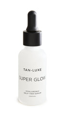 TAN-LUXE Super Glow bottle showcasing hyaluronic self-tan serum for a hydrated glow.