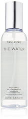 Tan-Luxe The Water mist application shows easy, mess-free coverage for hydrated glow.