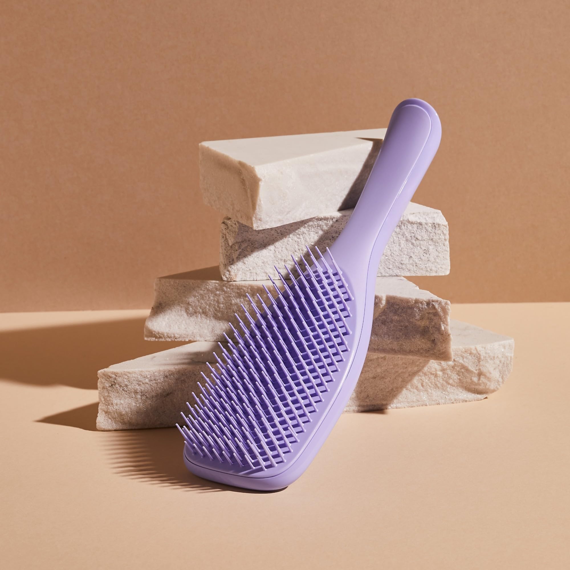 Tangle Teezer all-hair-types brush suits straight to curly hair.