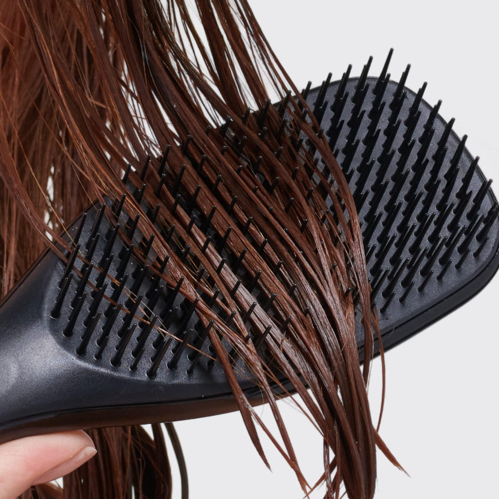 Tangle Teezer Ultimate Detangler suitable for all hair types, from straight to curly.