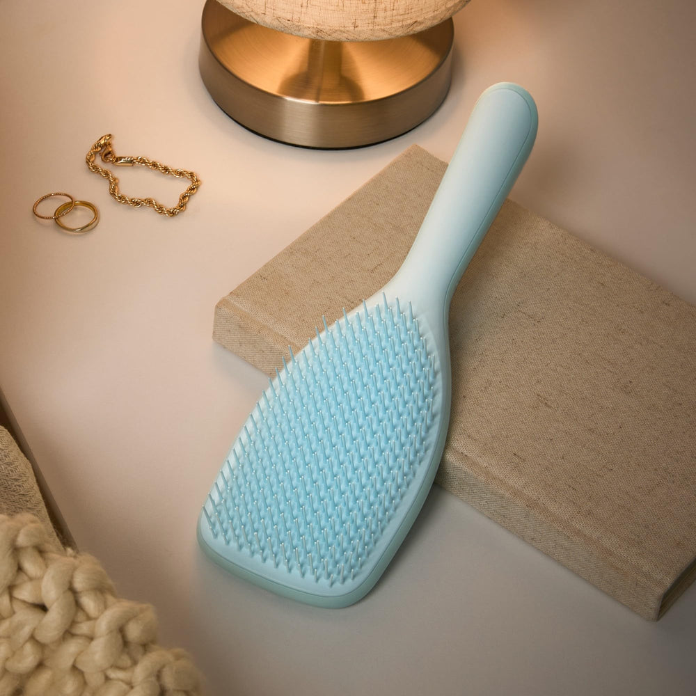 Tangle Teezer haircare product distribution action view