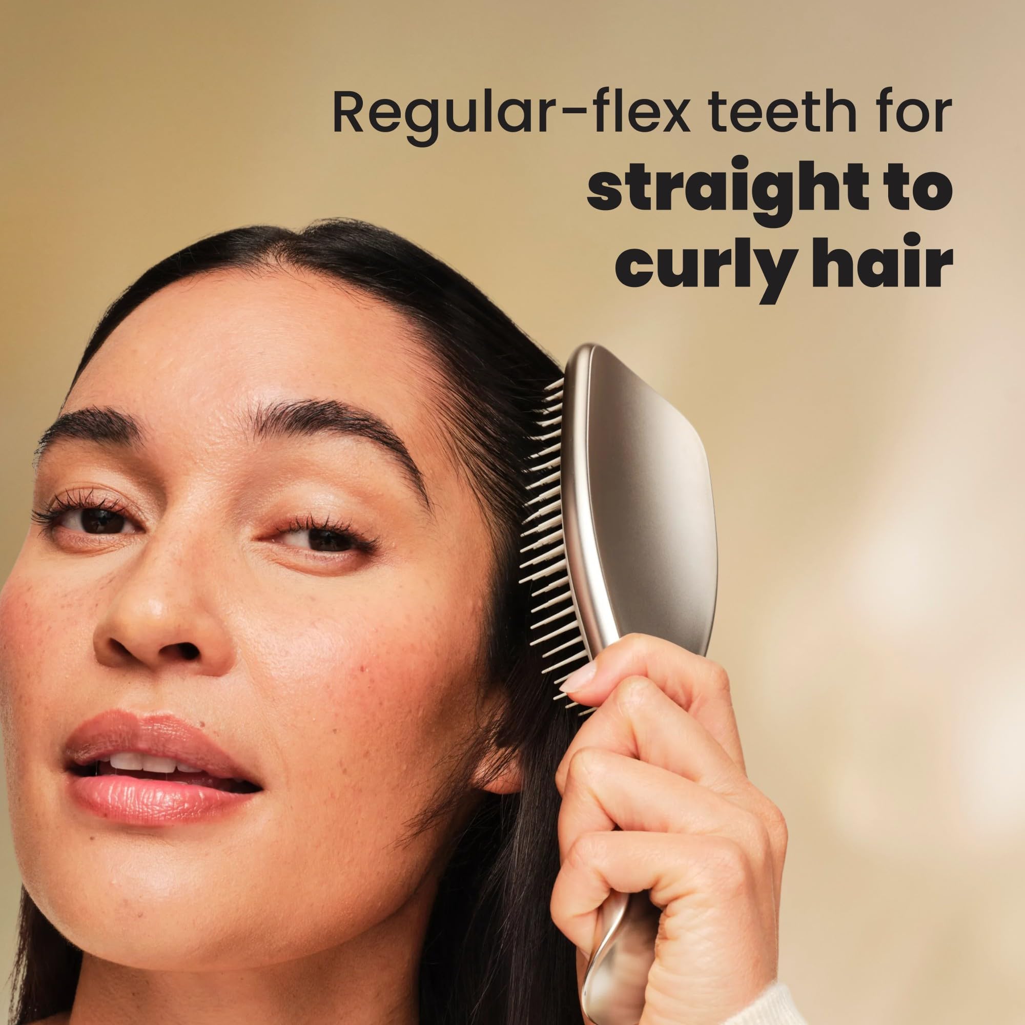 Tangle Teezer Chrome ergonomic grip shown for comfortable detangling sessions.