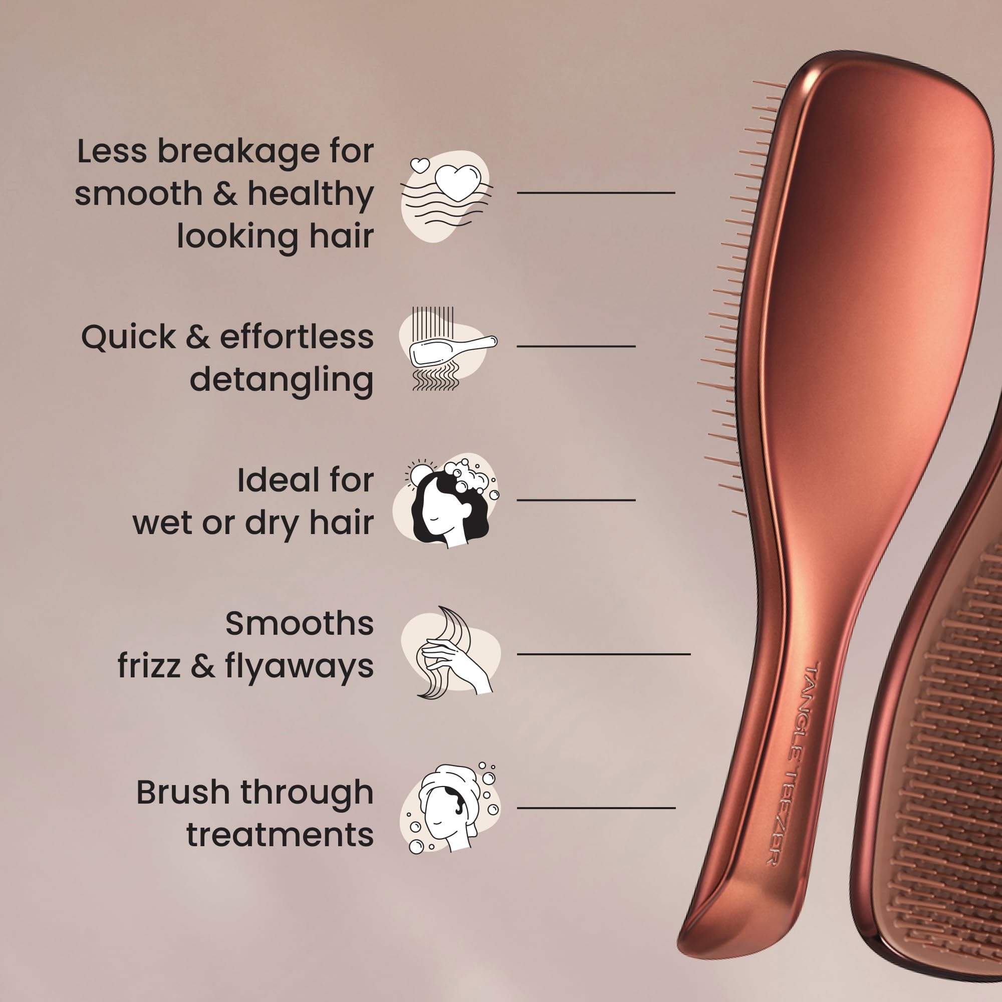 Tangle Teezer Chrome Ultimate Detangler in-hand grip highlights shower-friendly grip