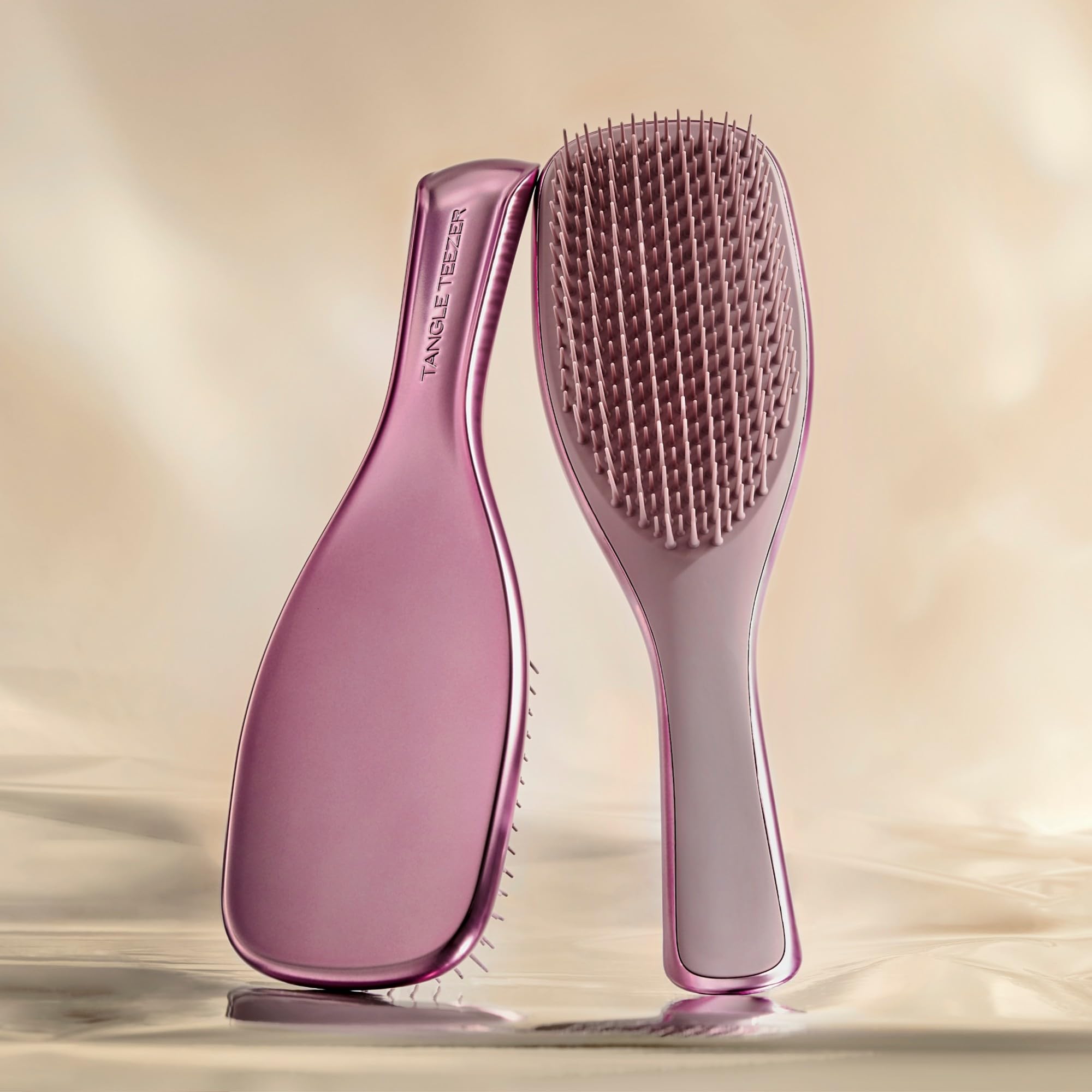 Tangle Teezer Chrome Ultimate Detangler detangles dry hair with minimal tugging.