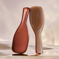 Tangle Teezer Chrome Ultimate Detangler teeth close-up showing two-tier teeth for gentle detangling