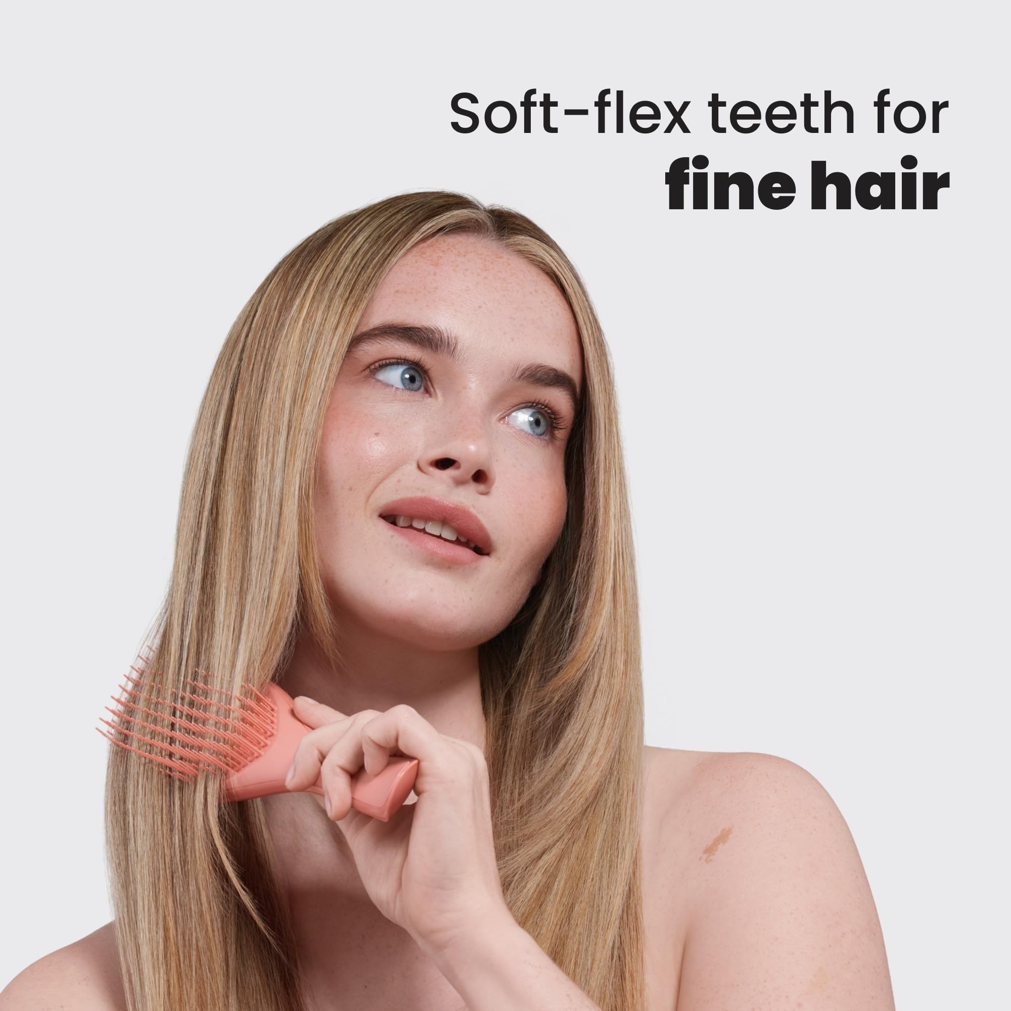 Tangle Teezer detangler in use for even conditioner distribution