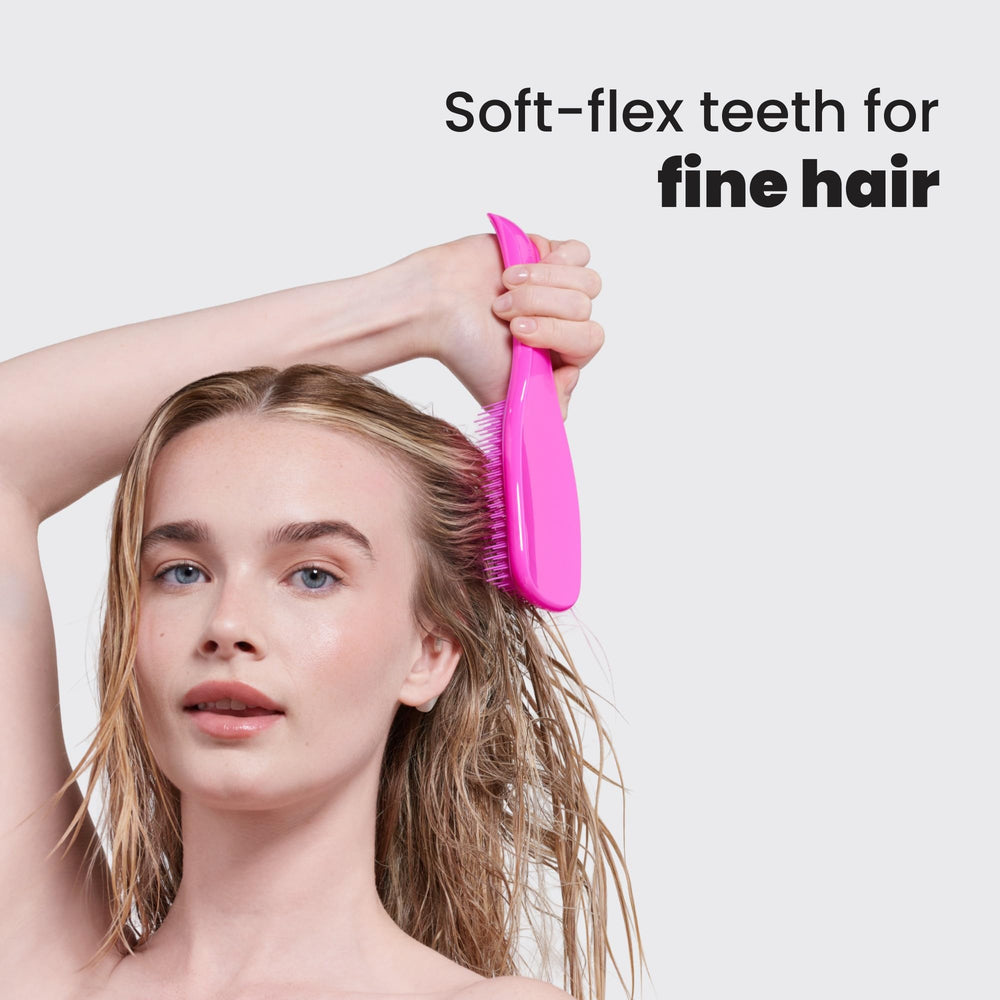 Tangle Teezer Runway Pink hands detangling delicate strands