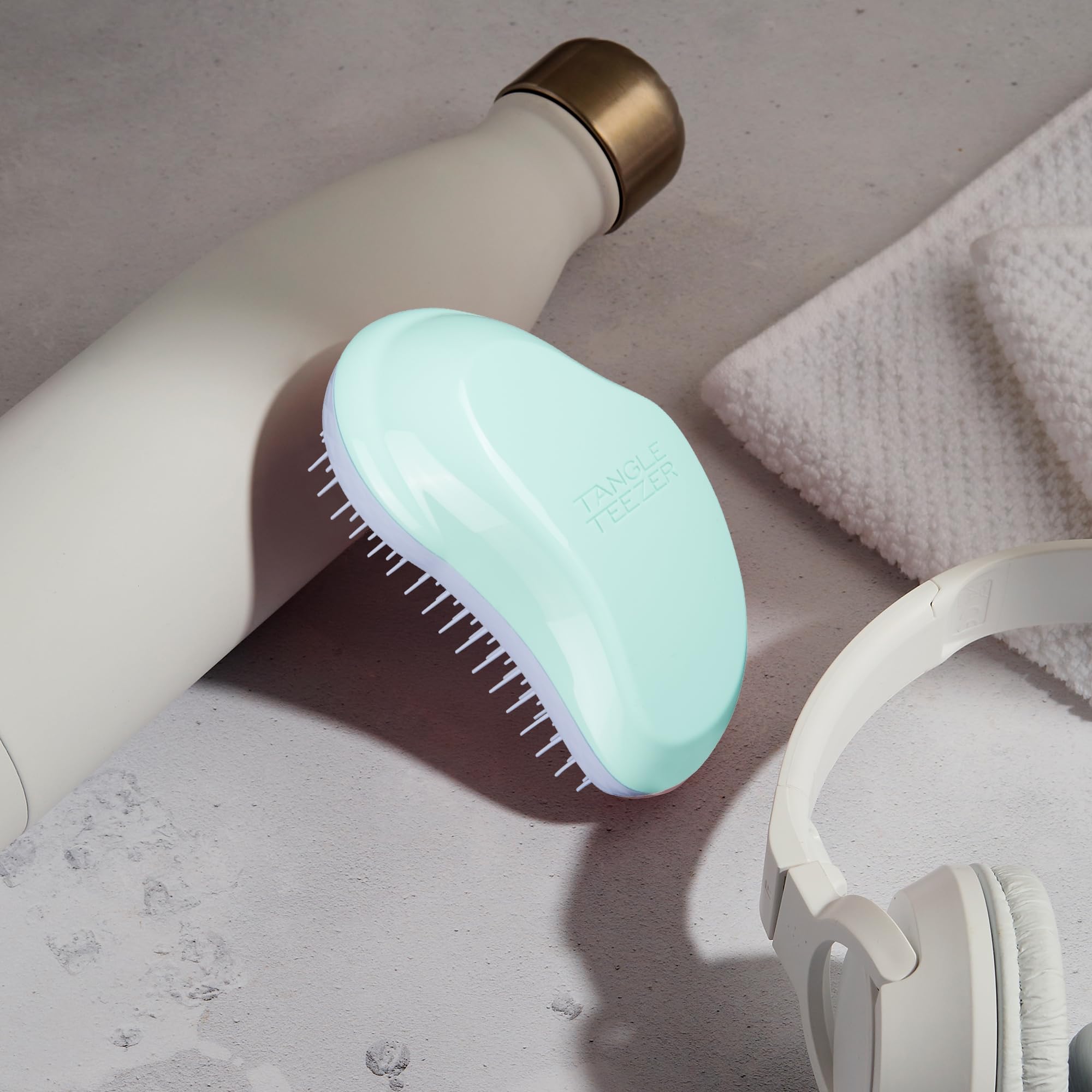 Soft-flex teeth close-up emphasizing 30% softer design than Original