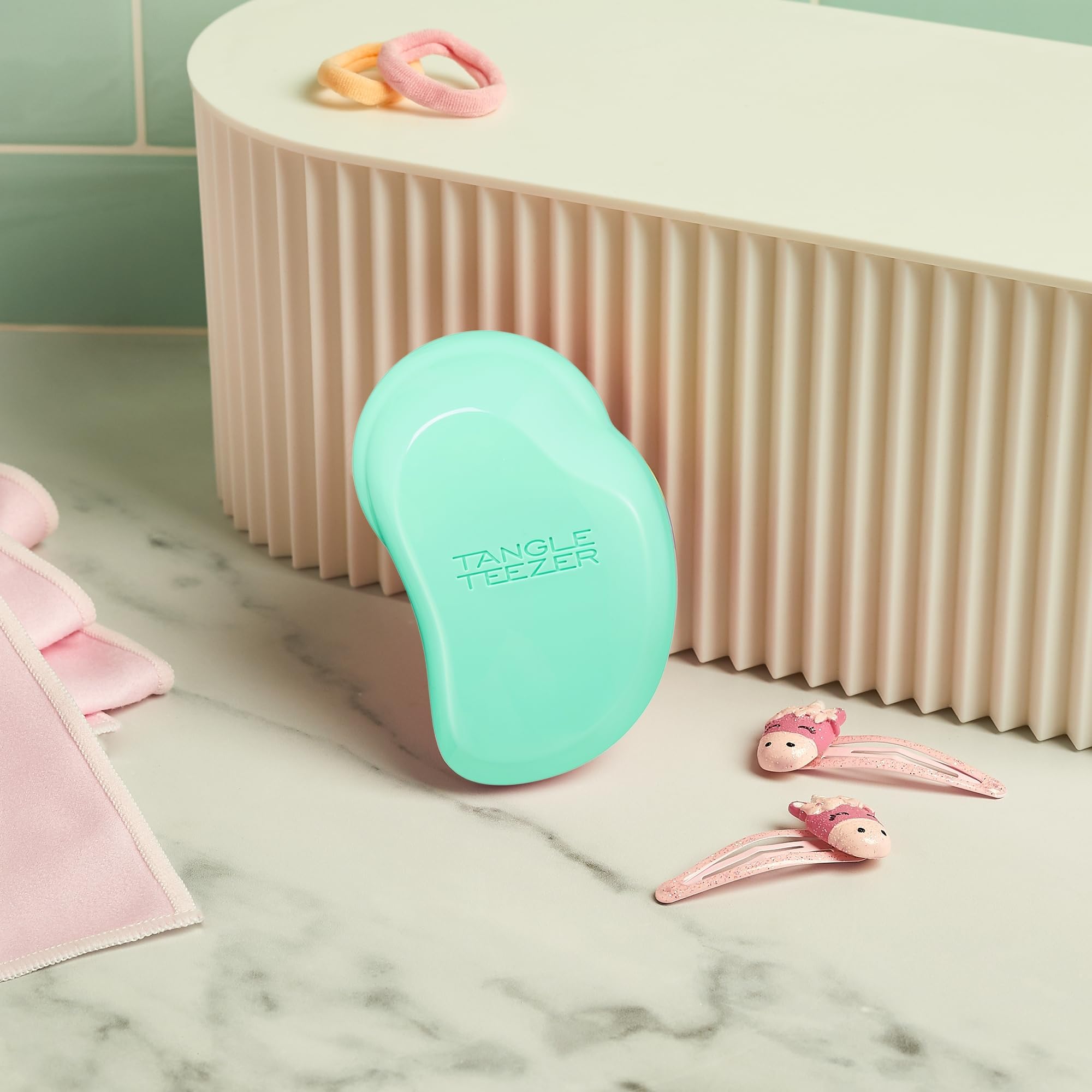 Tangle Teezer Paradise Green travel-size brush ready for on-the-go