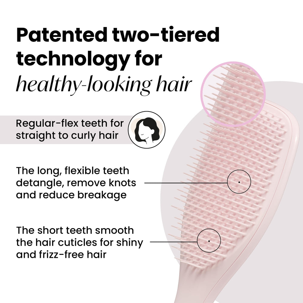 Tangle Teezer plant-based detangler brush teeth closeup shows two-tier teeth for knot removal.