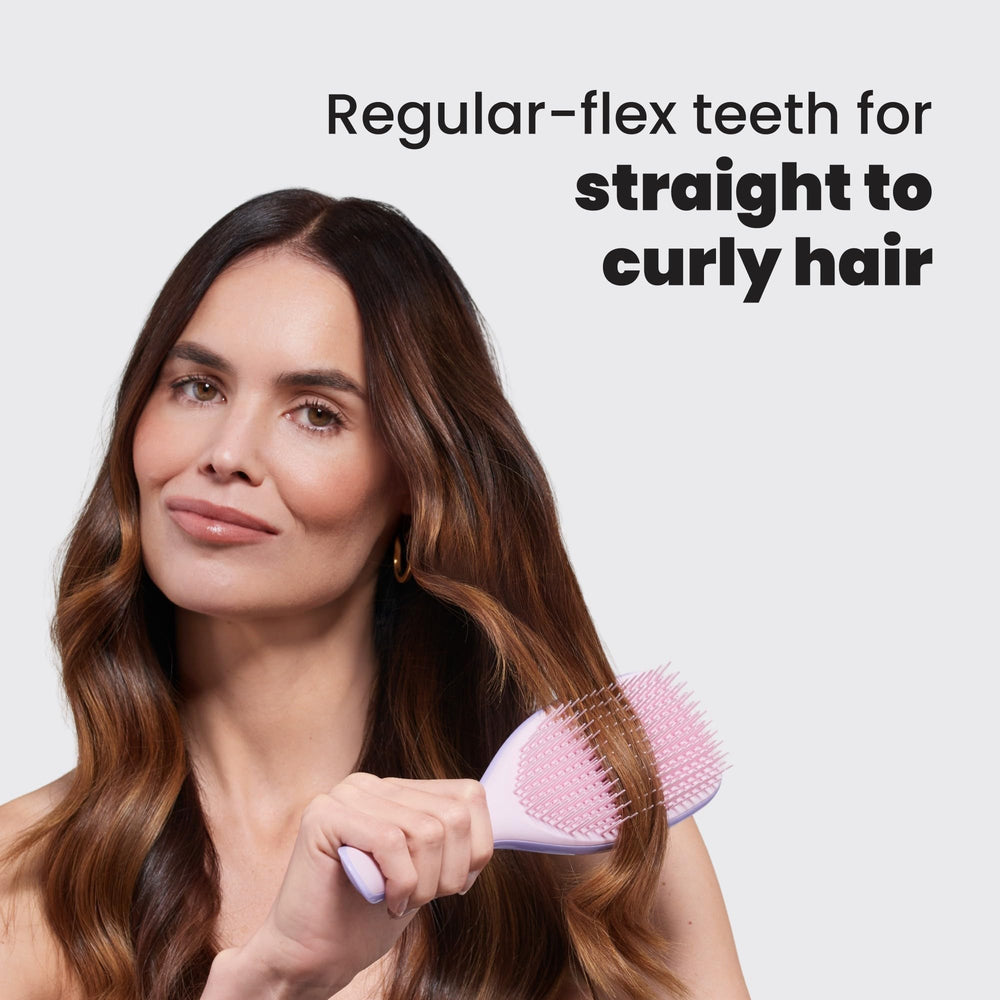 Tangle Teezer Ultimate Detangler after-shower use demonstrates even conditioner distribution for silky hair.