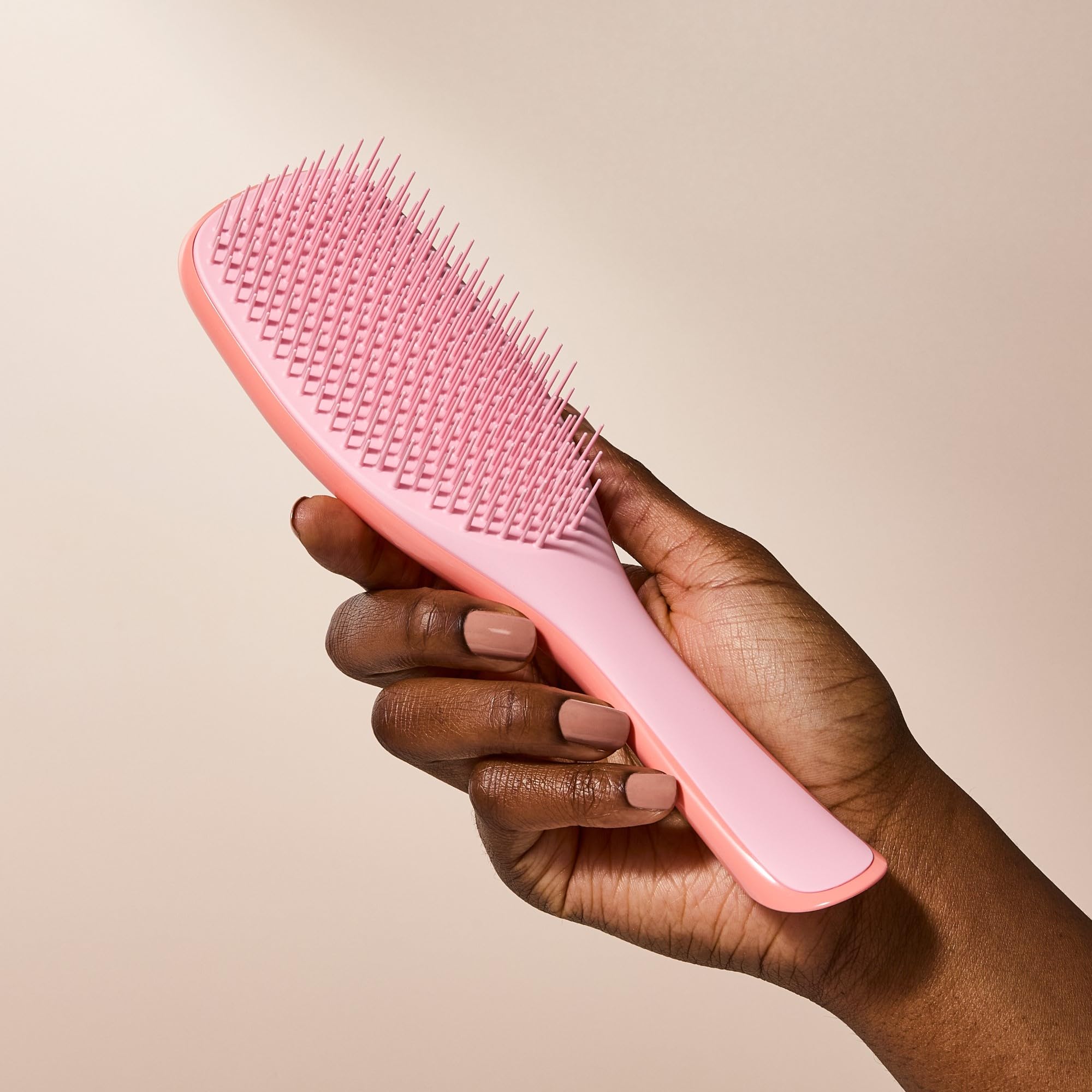 Tangle Teezer before-after curls show improved texture and manageability.