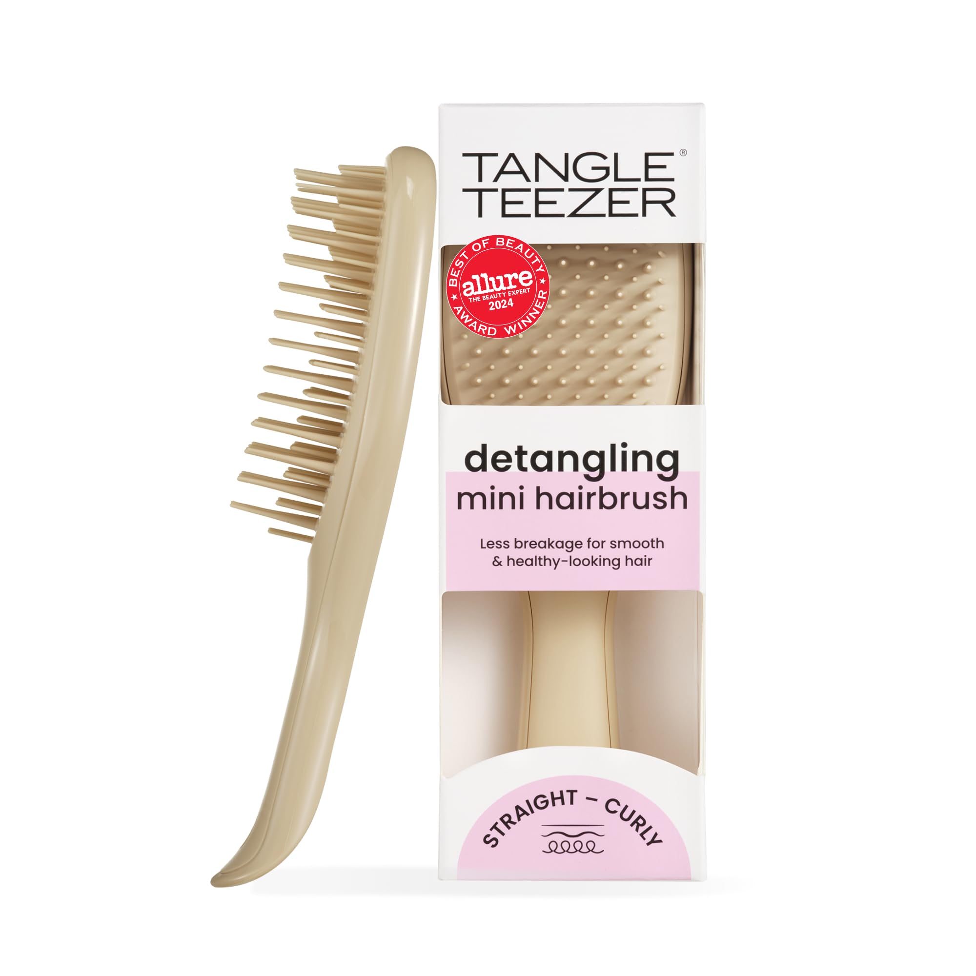 Tangle Teezer Ultimate Detangler brush close-up showing two-tier teeth for gentle detangling