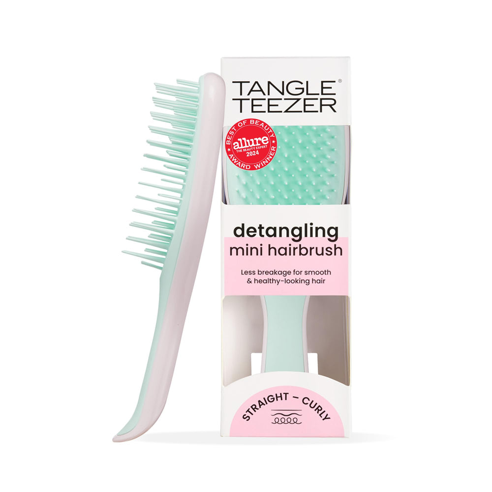 Tangle Teezer Ultimate Detangler front view shows compact travel-ready design for on-the-go detangling.