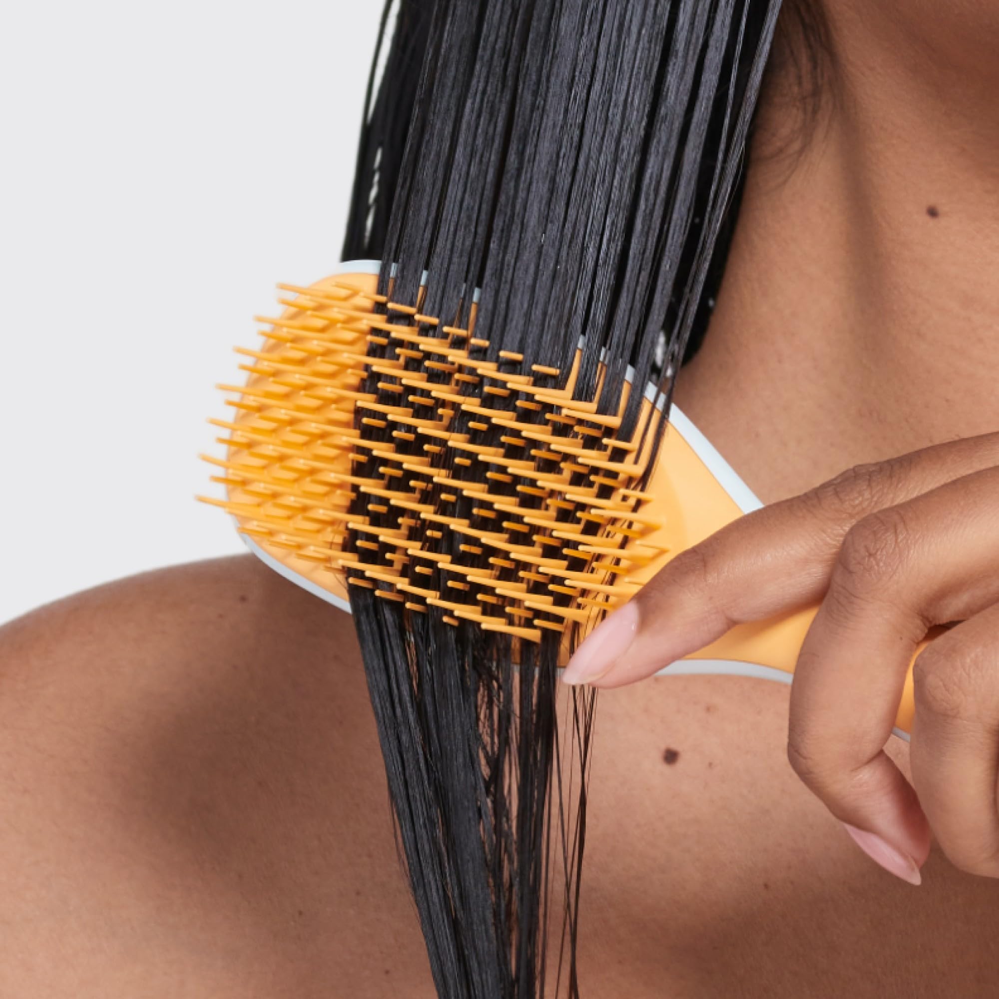 Tangle Teezer suitable for all hair types, from straight to curly, with gentle action.
