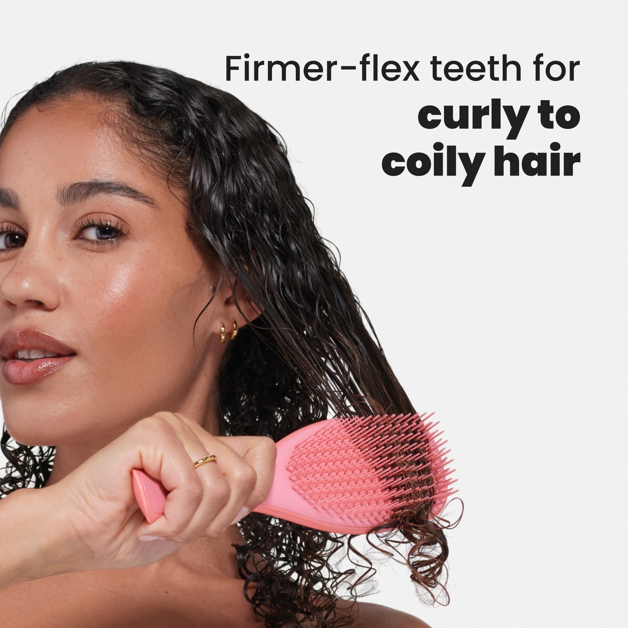 Tangle Teezer Ultimate Detangler illustrates even conditioner distribution through curls.
