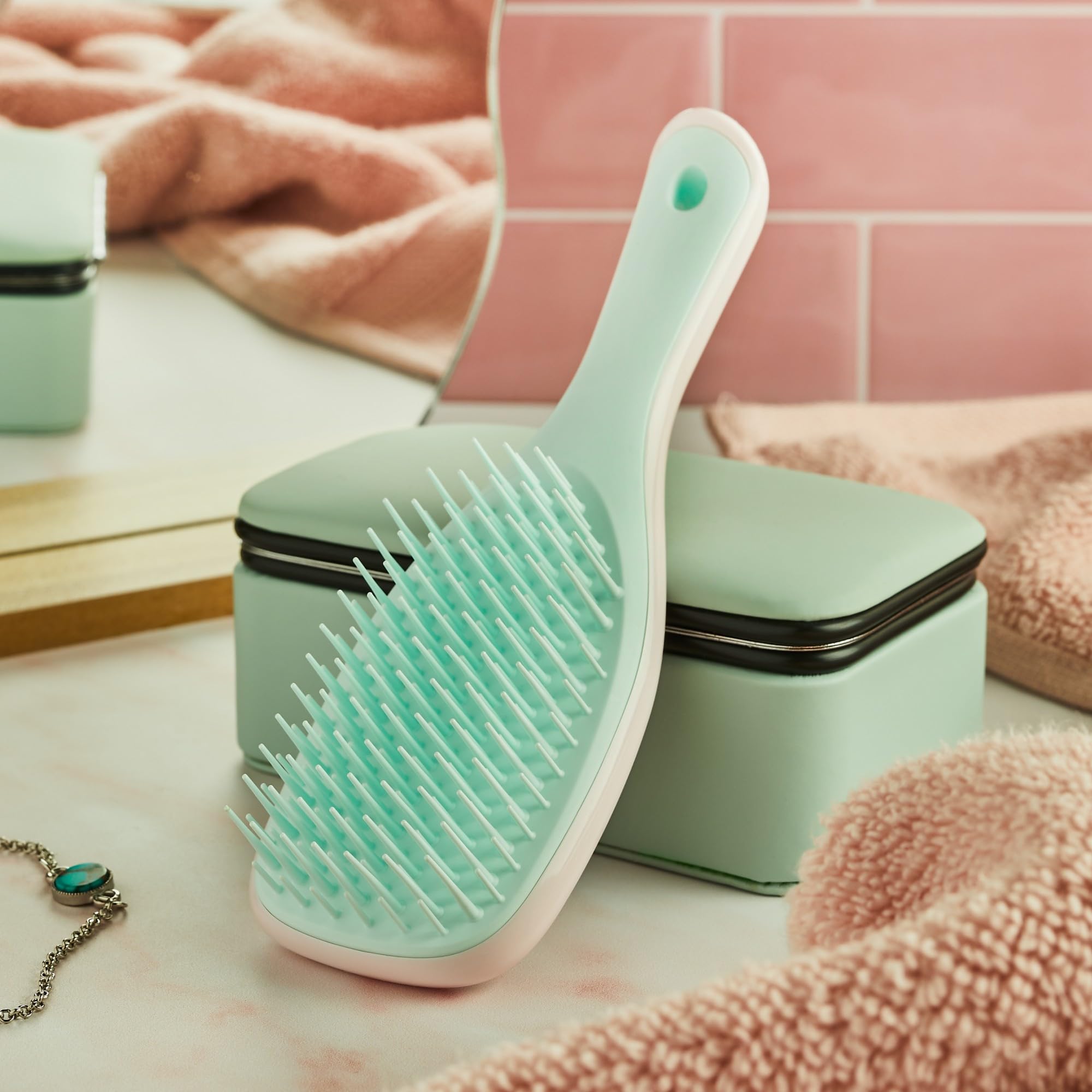 Tangle Teezer Ultimate Detangler Marshmallow Pink & Mint colorway in product shot for stylish daily use.