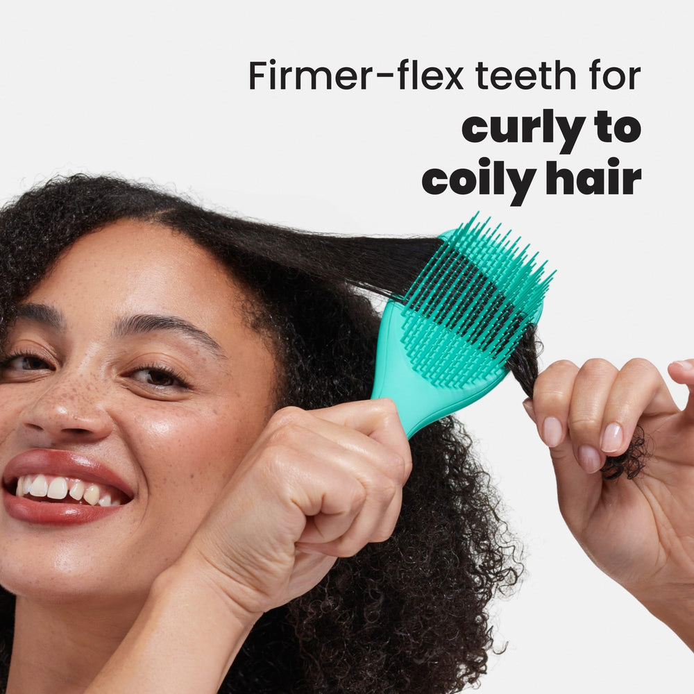 Product shot highlighting Tangle Teezer Ultimate Detangler's two-tier teeth technology