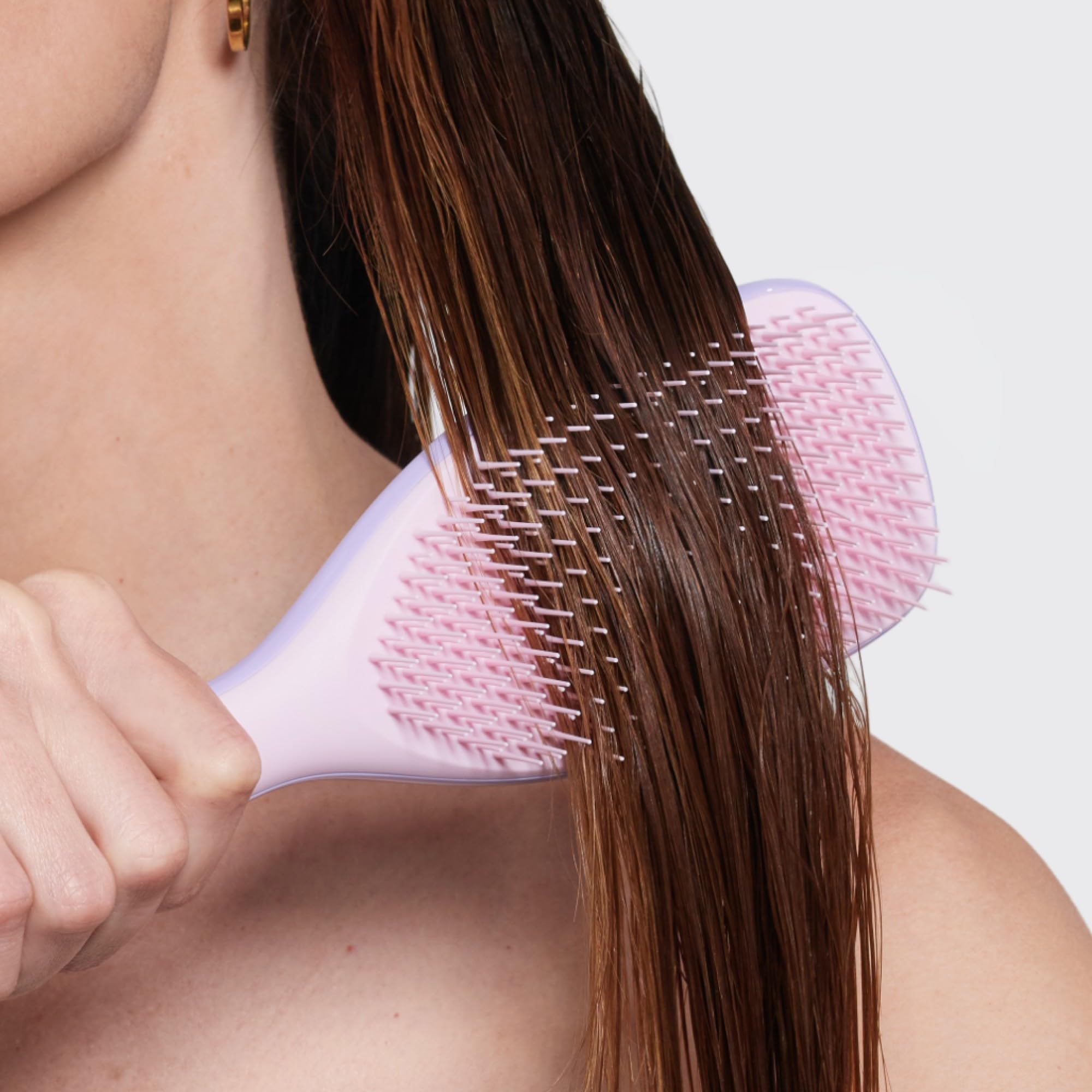 Tangle Teezer Ultimate Detangler en rosa y púrpura, ideal para uso diario.