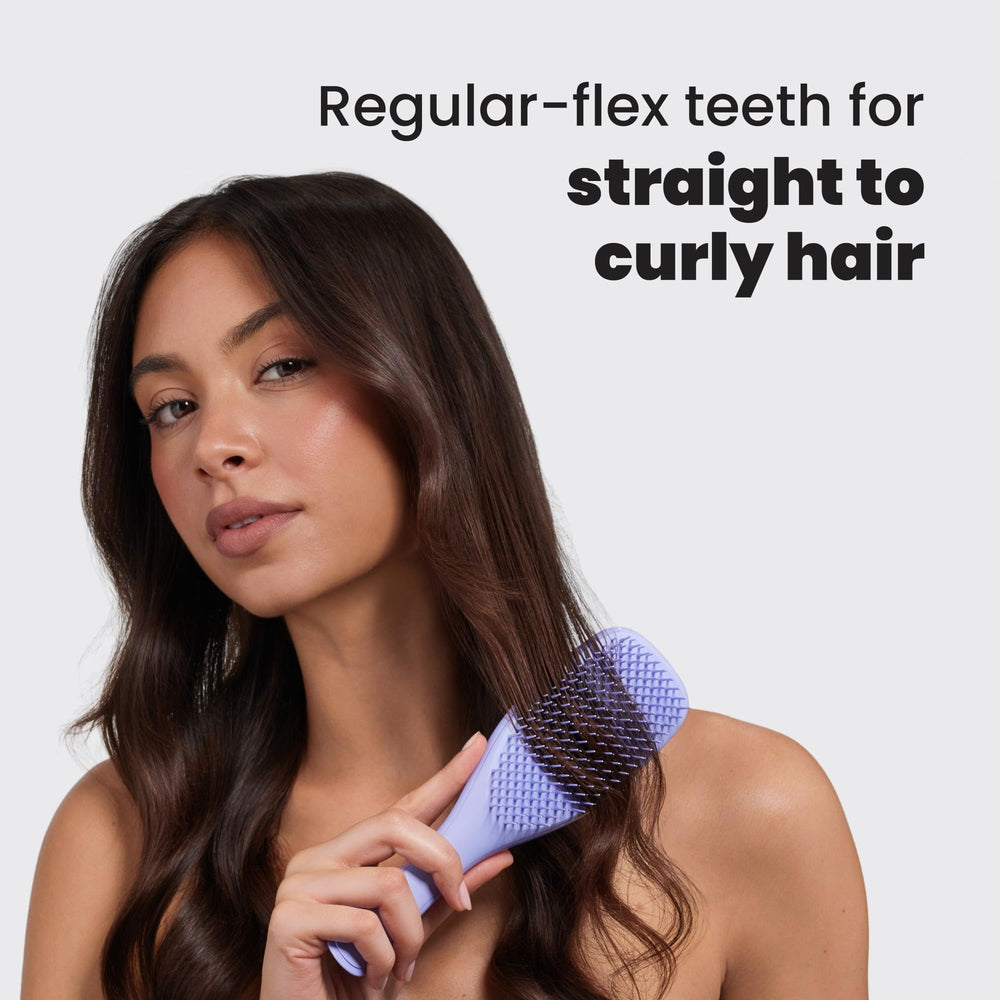 Tangle Teezer shower-brush distributes conditioner evenly.