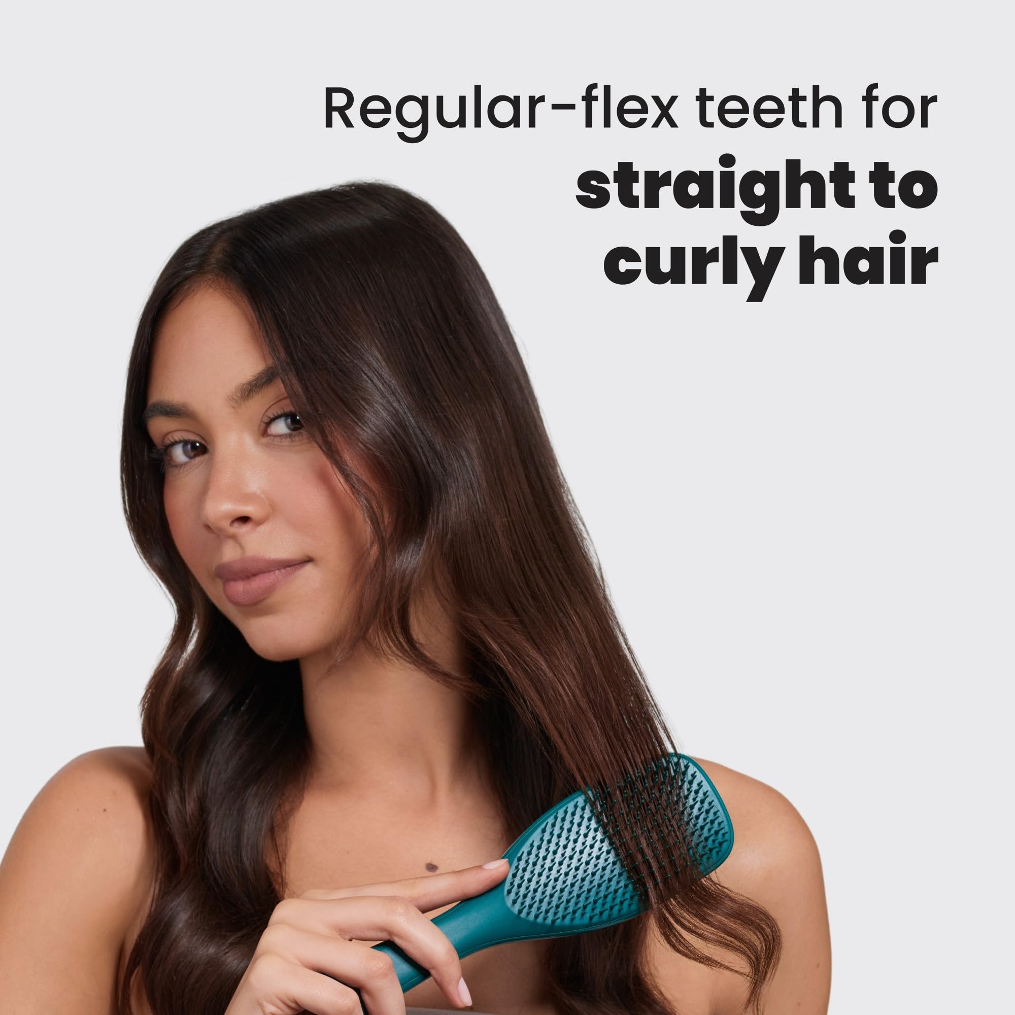 Tangle Teezer Ultimate Detangler in action on wet hair during conditioning application.