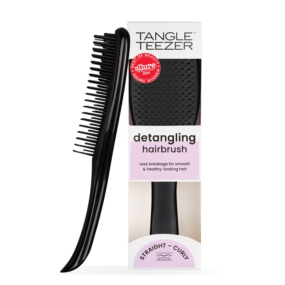 Tangle Teezer Ultimate Detangler on wet hair for gentle knot removal and smooth results.