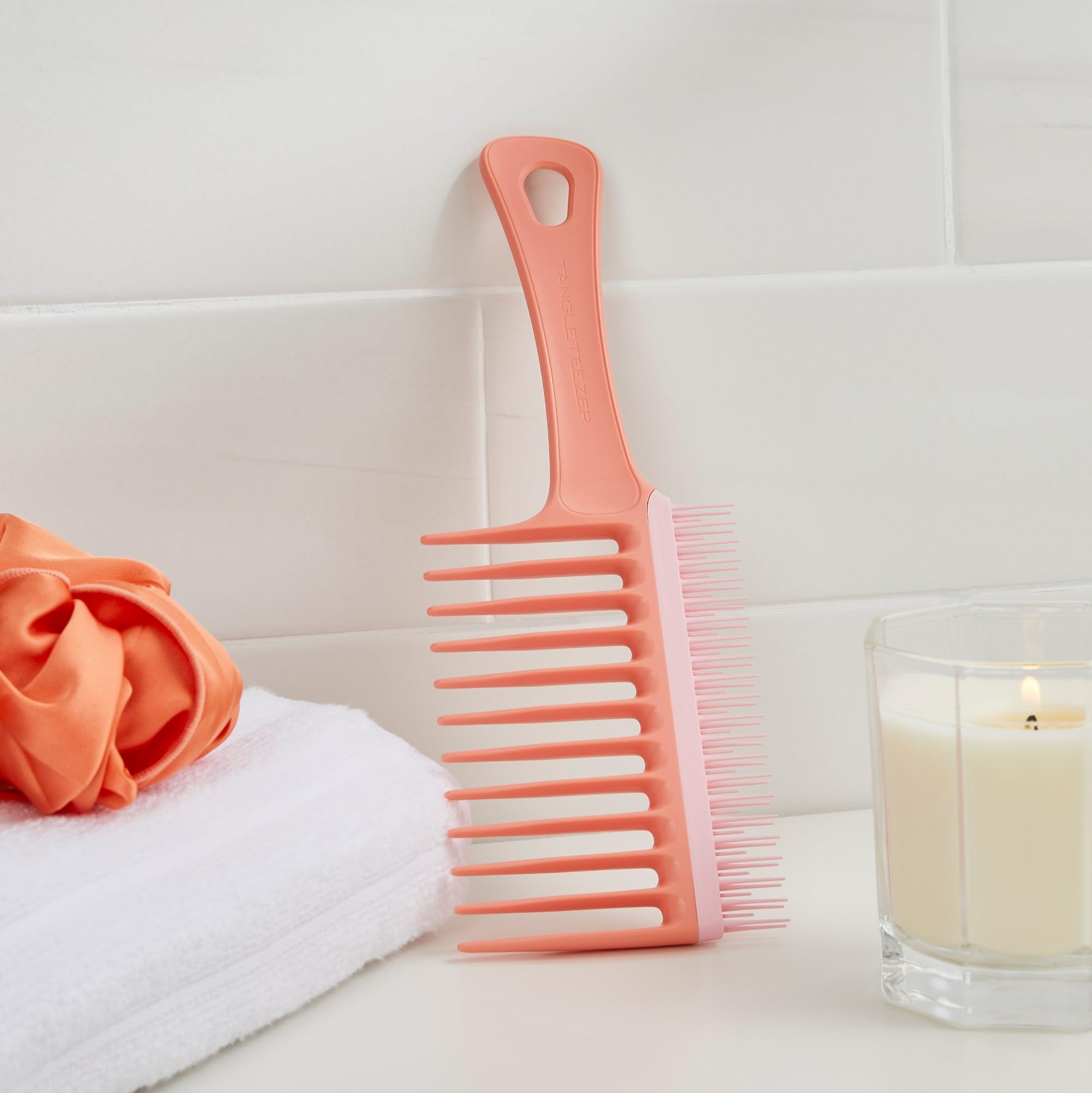 Tangle Teezer Wide Tooth Comb Peach conditioner distribution for evenly nourished curls.